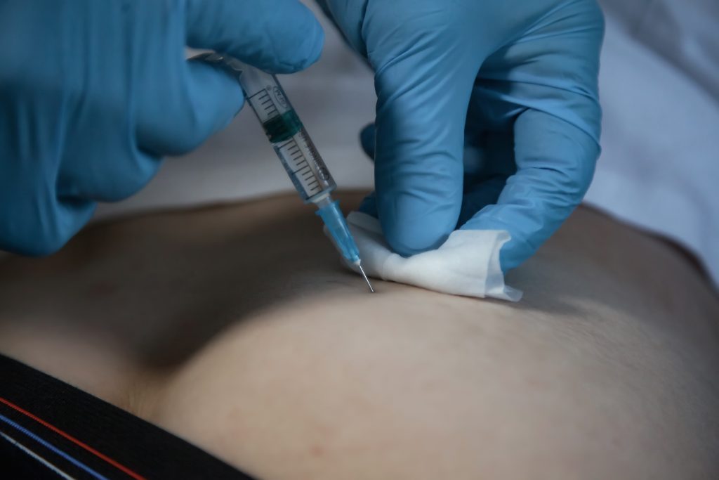 injecting a need to a patient